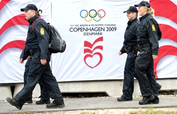Danish police patrol the Bella Center, the site of the upcoming 121st International Olympic Committee Session, in Copenhagen, on Monday