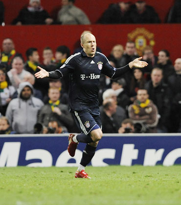 Arjen Robben celebrates after scoring