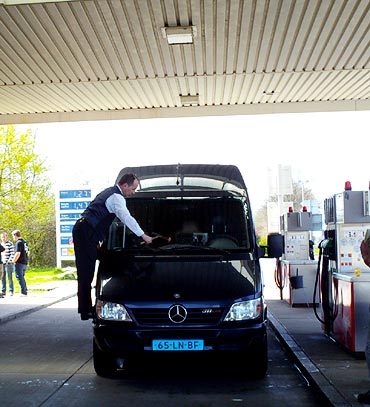 The Mercedes Sprinter stops at a gas station