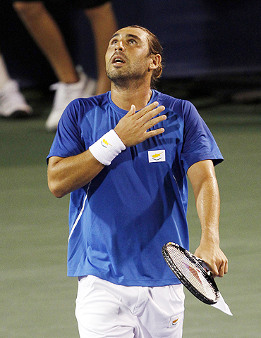Marcos Baghdatis of Cyprus celebrates after defeating Rafael Nadal of Spain in the quarter-final at the Cincinnati Masters on Friday