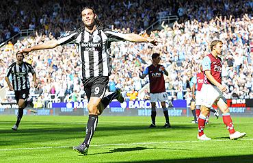 Newcastle United's Andy Carroll (2nd L) celebrates after scoring against Aston Villa on Sunday