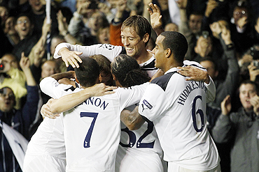 Tottenham Hotspur's Peter Crouch (centre) celebrates with teammates after scoring against Young Boys on Wednesday
