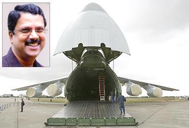 A Russian Antonov cargo plane and (inset) IAS officer Jiji Thomson