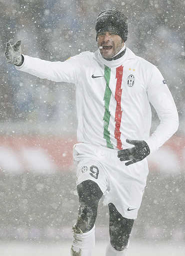 Juventus' Vincenzo Iaquinta celebrates after scoring against Lech on Wednesday