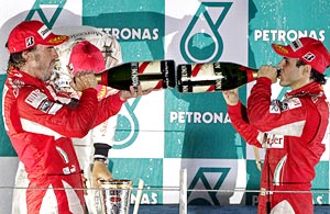 Ferrari drivers Fernando Alonso (left) and Felipe Massa