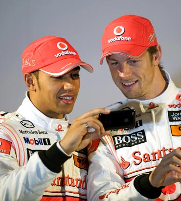 McLaren drivers Lewis Hamilton (left) and Jenson Button
