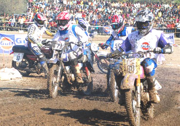 Bikers race in the Private Expert Class