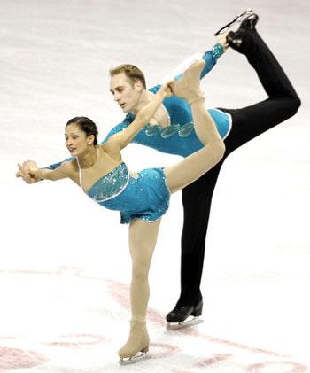 Mark Ladwig (right) and Amanda Evora compete during the championship pairs free skate in the US Figure Skating Championship