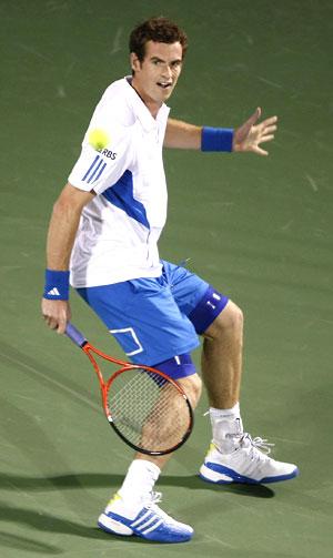 Andy Murray returns during his match against Russia's Igor Kunitsyn