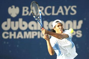 Somdev Devvarman returns a shot against Marcos Baghdatis during their second round tie at the Dubai C'ships