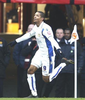 Jermaine Beckford celebrates after scoring