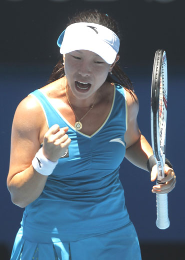 Zheng reacts after her quarter-final against Kirilenko
