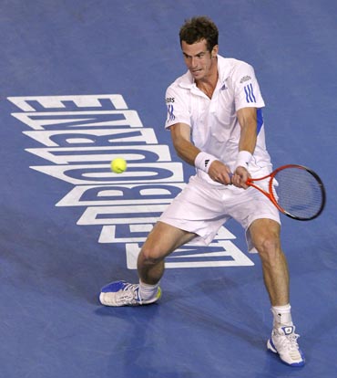 Andy Murray in action against Roger Federer