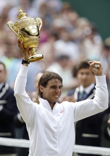 Rafa Nadal with the winners trophy