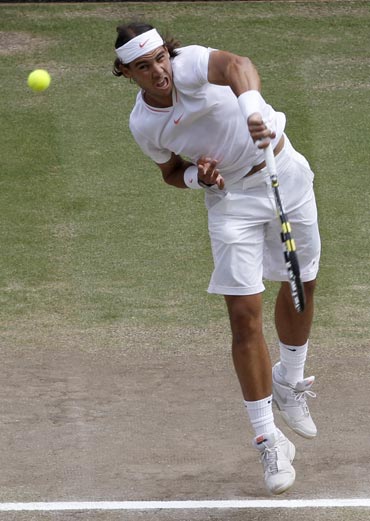 Rafa Nadal returns to Tomas Berdych