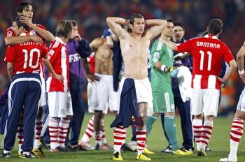 Paraguya players react after the match