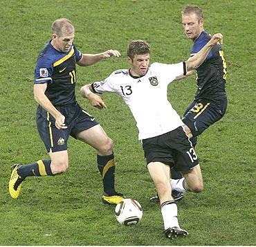 Thomas Mueller (in white)