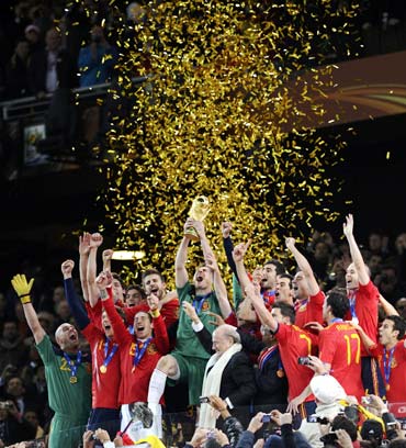 Spanish players celebrate after winning the World Cup