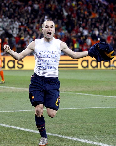 Spain's Andres Iniesta celebrates after scoring
