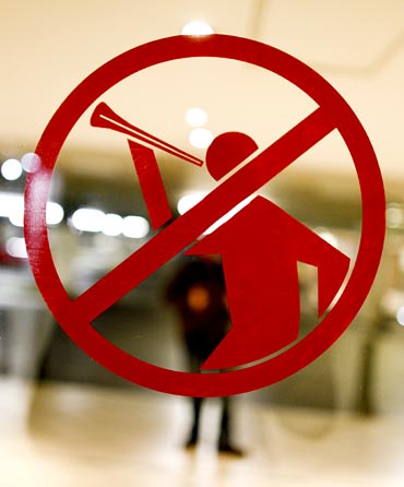 A sticker forbidding the blowing of vuvuzelas is seen on a door of a mall in Bloemfontein