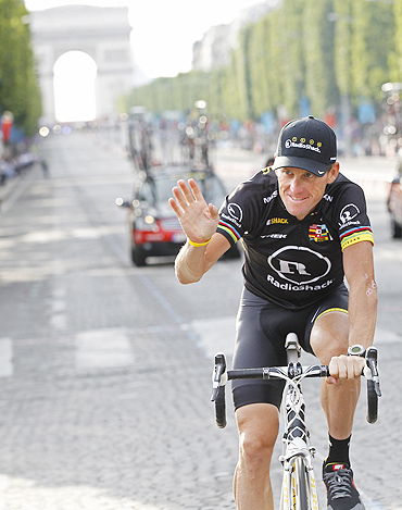 Radioshack's Lance Armstrong on the Champs Elysees during the final parade of Tour de France in Paris on Sunday