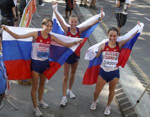 Olga Kaniskina (C) with silver medallist Anisya Kirdyapkina (L) and bronze medallist Vera Sokolova