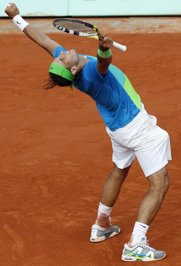 Rafa Nadal celebrates after beating Nicolas Almagro