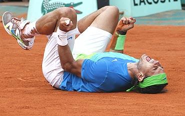 Rafael Nadal celebrates after winning the French Open