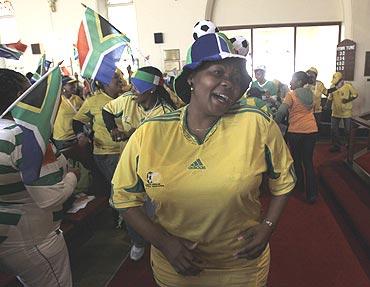 Football fans attends a service at the Sunnyside Methodist Church in Pretoria