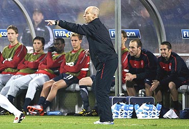 US coach Bob Bradley shouts instructions from the sidelines during the match against England