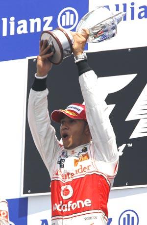 Lewis Hamilton rejoices after winning the Canadian GP