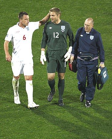 england's john terry consoles robert green (centre) after the match