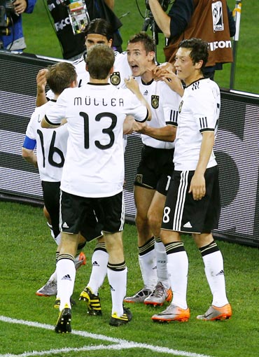 German players celebrate after scoring a goal
