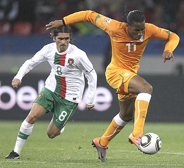 didier drogba (right) in action against Portugal