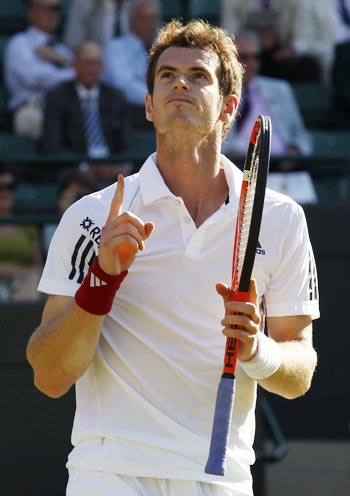 Andy Murray celebrates after winning the match
