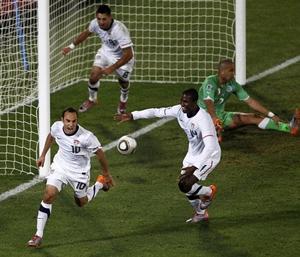 Landon Donovan celebrates after scoring the winner