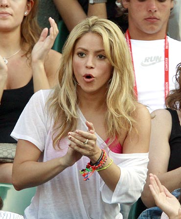 Singer Shakira watches Rafael Nadal play Paul-Henri Mathieu
