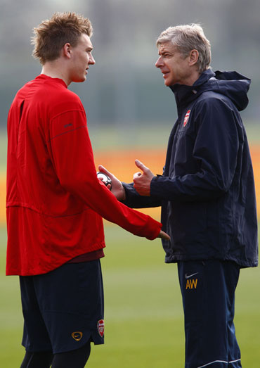 Bendtner and coach Wenger