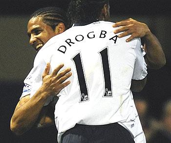 Chelsea's Florent Malouda (left) celebrates with team-mate Didier Drogba after scoring