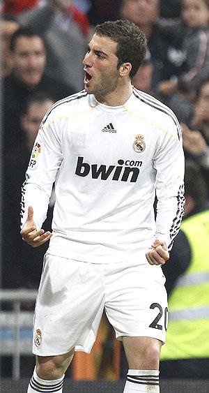 Real Madrid's Gonzalo Higuain celebrates his goal against Atletico Madrid