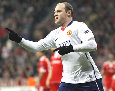 Manchester United's Wayne Rooney celebrates after scoring the opening goal
