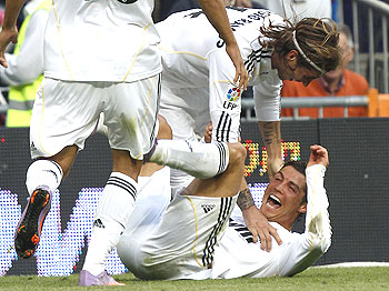 Real Madrid's Cristiano Ronaldo (right) celebrates his second goal against Osasuna with team-mate Sergio Ramos