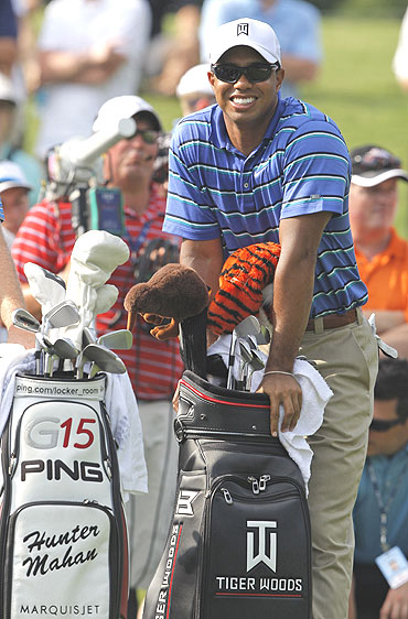 Tiger Woods waits to tee off on the 16th hole during first round play of the Tournament Players Championship at TPC Sawgrass in Ponte Vedra Beach, Florida