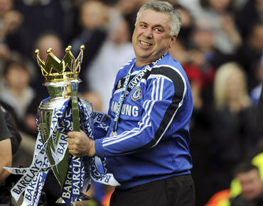 Carlo Ancelotti with the trophy