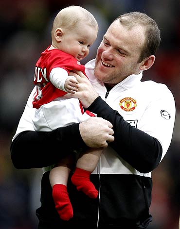 Rooney with his son Kai