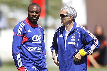 French coach Raymond Domenech (right) speaks with William Gallas