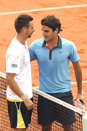 Roger Federer (right) and Robin Soderling
