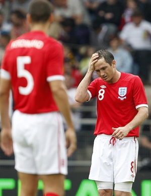 Frank Lampard reacts after missing a penalty