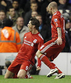 Liverpool's Fernando Torres celebrates with Raul Meireles (right) after scoring against Chelsea