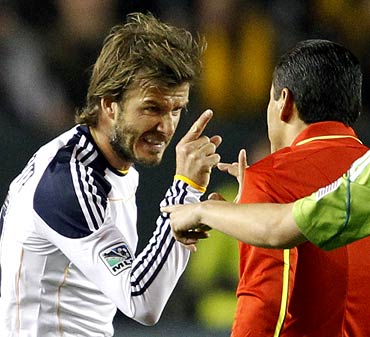 David Beckham argues with the referee